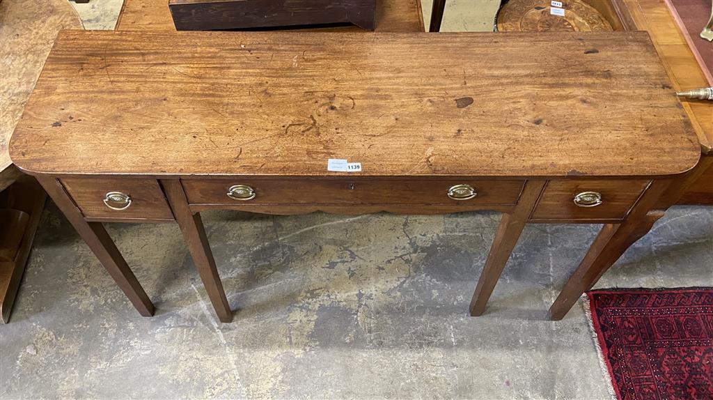 A late George III mahogany three drawer serving table, width 150cm, depth 46cm, height 85cm